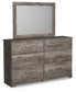Ralinksi Queen Panel Bed with Mirrored Dresser
